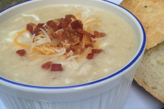 bowl of cream potato and cauliflower cheesy soup