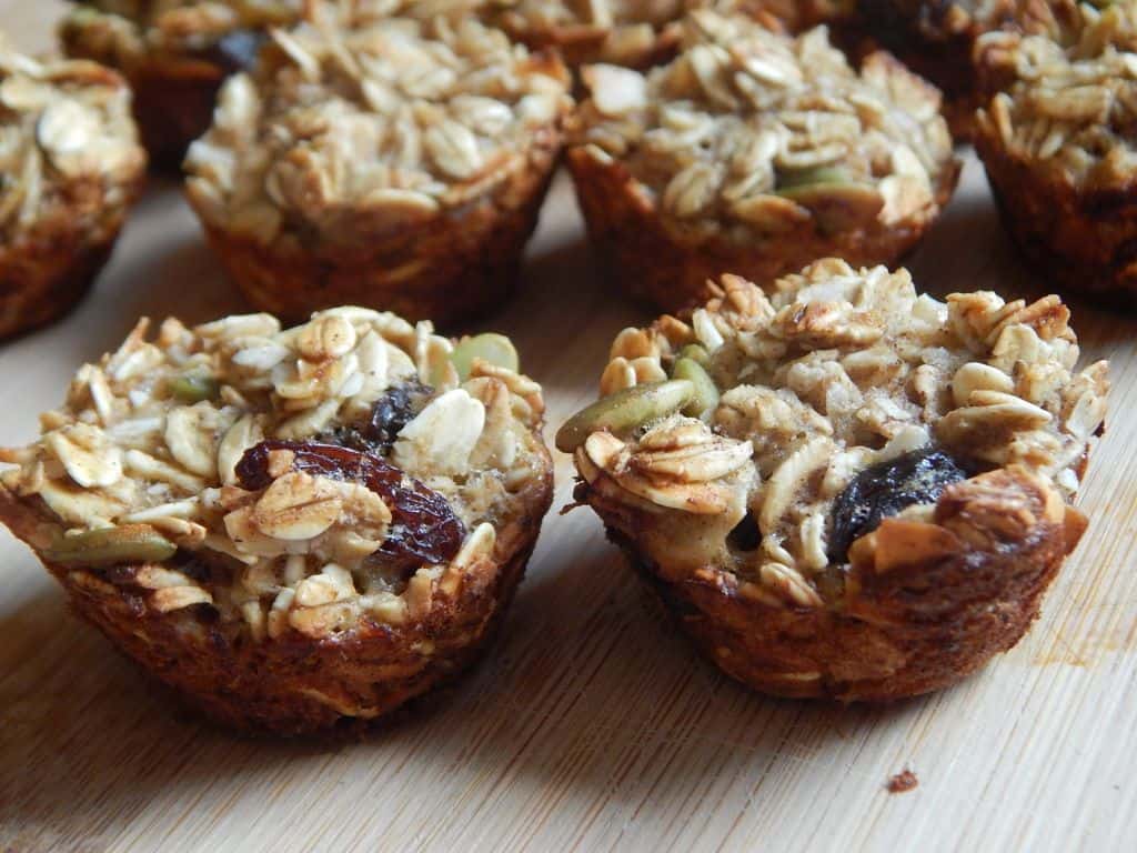 trail mix muffins on wood counter