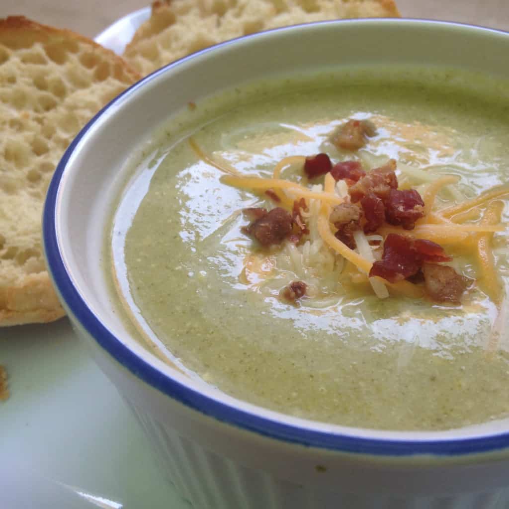 brocoli cheddar soup in white bowl
