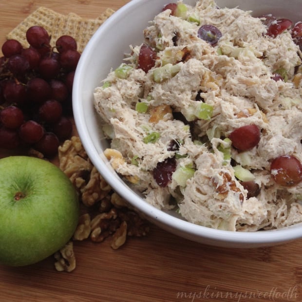 light derby chicken in white bowl with apples on side