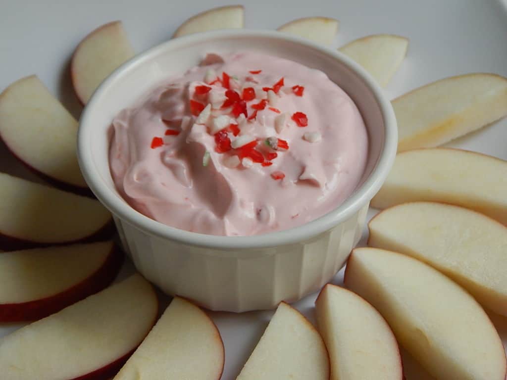 candy cane dip with fruit slices