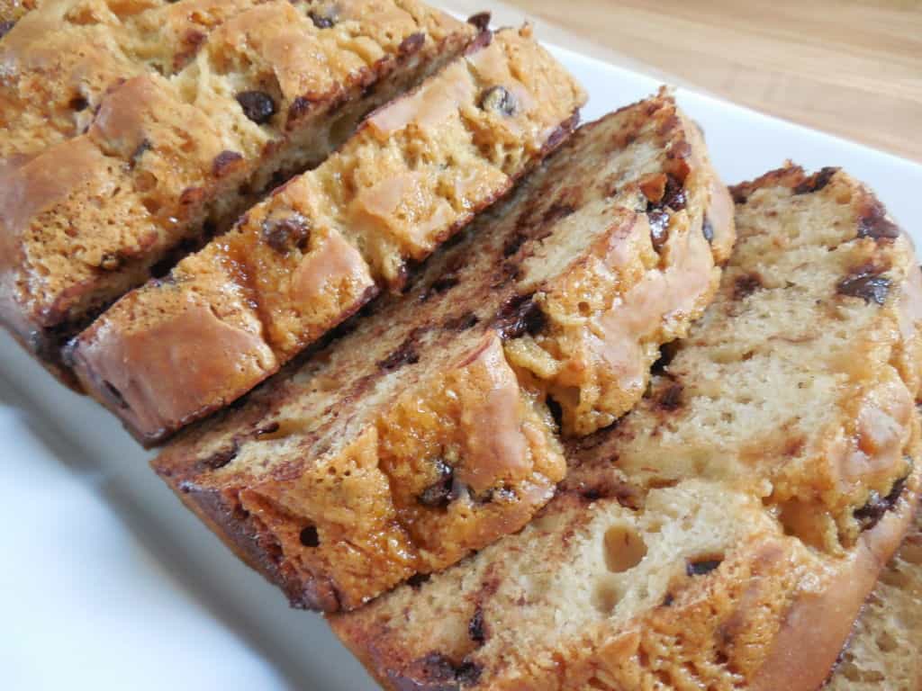 chocolate chip caramel bread sliced on white plate