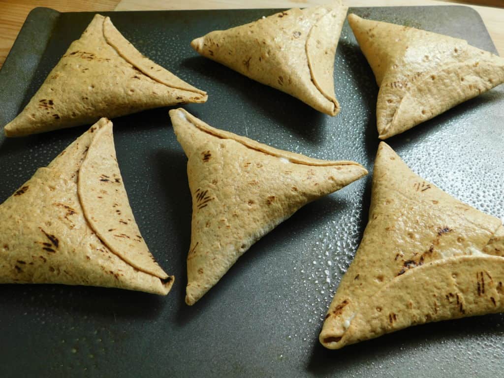 six cooked taco pockets