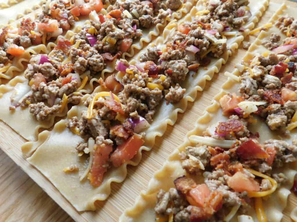 Bacon cheeseburger lasagna rolls Drizzle Me Skinny!