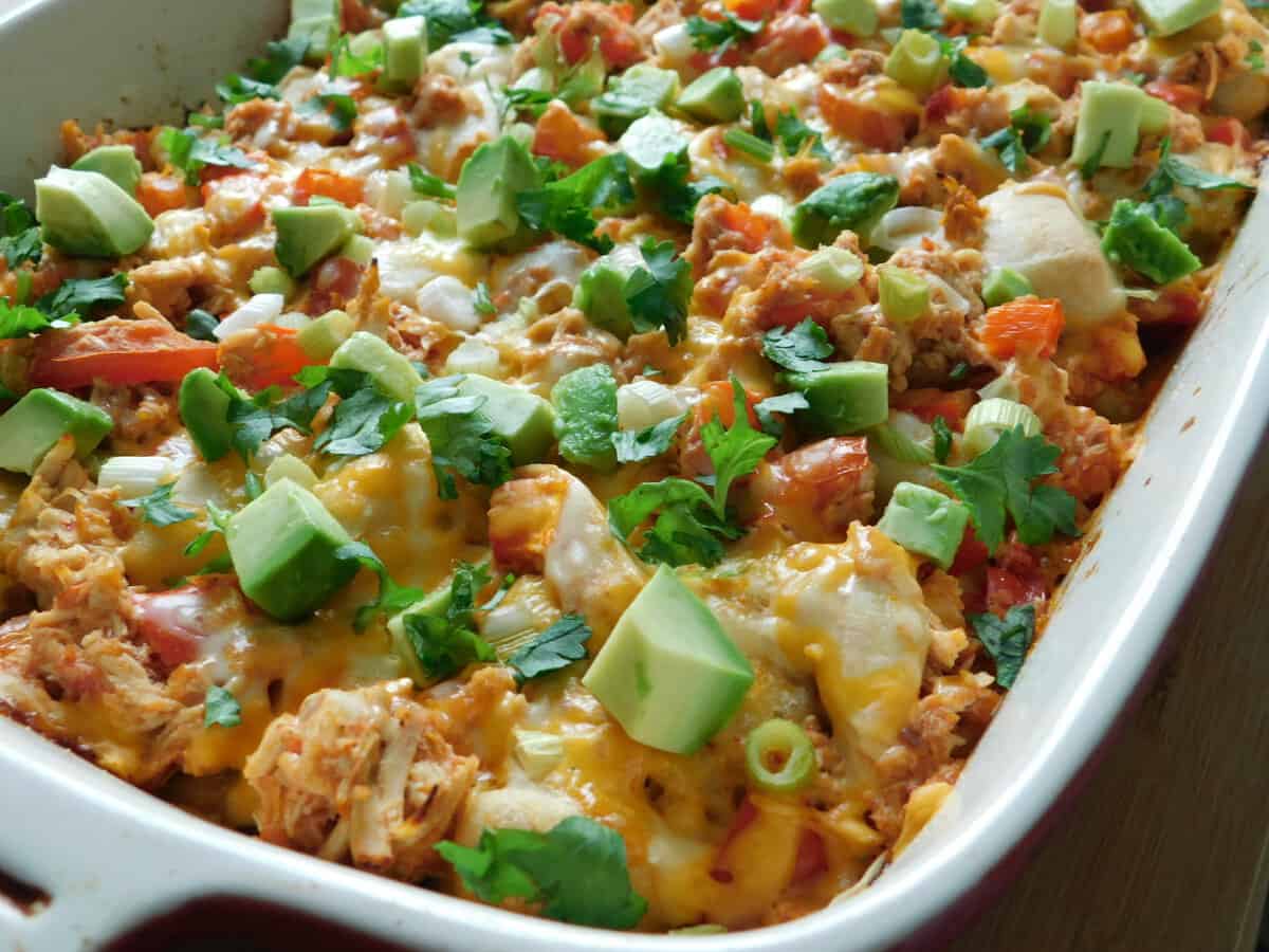 chicken enchilada bubble up in white casserole dish