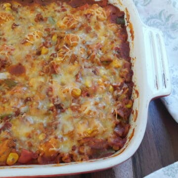 chicken chili bubble up in white casserole dish