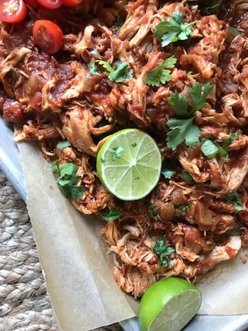 Delicious pulled chicken topped with cilantro and lime. 