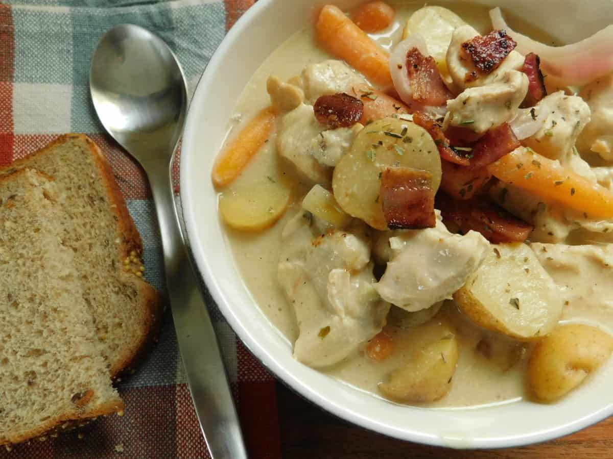 chicken stew in white bowl