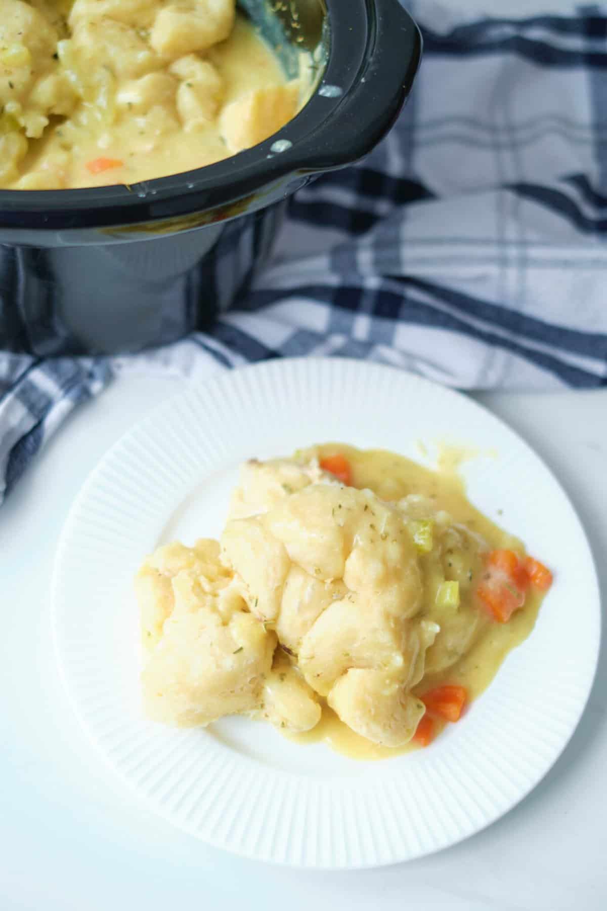 crockpot chicken and dumplings featuring canned biscuits