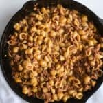 Homemade Hamburger Helper in skillet on white table cloth