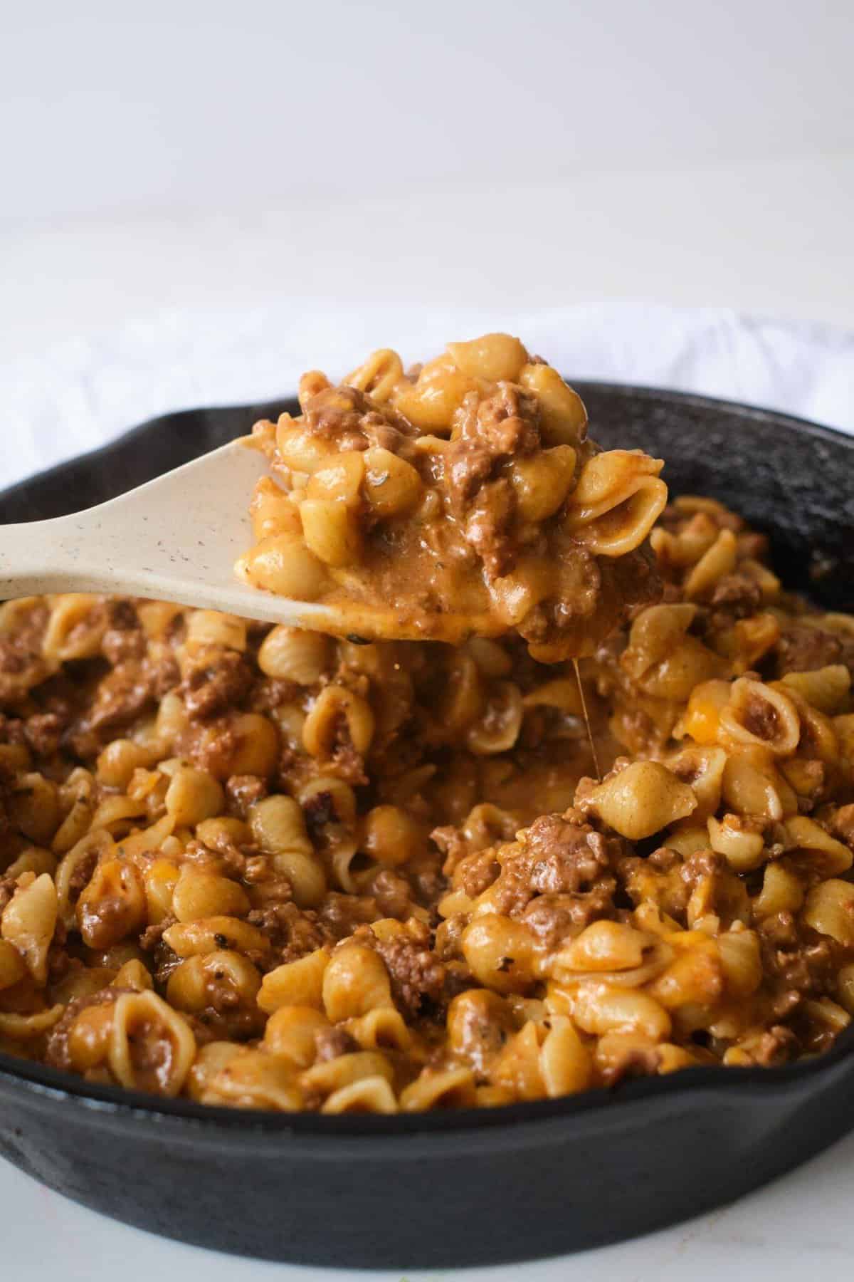 homemade hamburger helper in black skillet