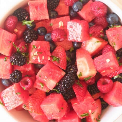 watermelon salad in white bowl