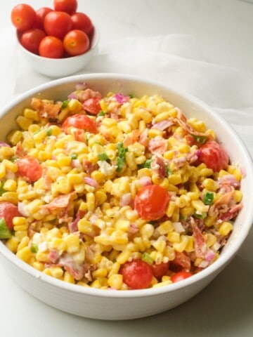 corn and grape tomato salad in a bowl