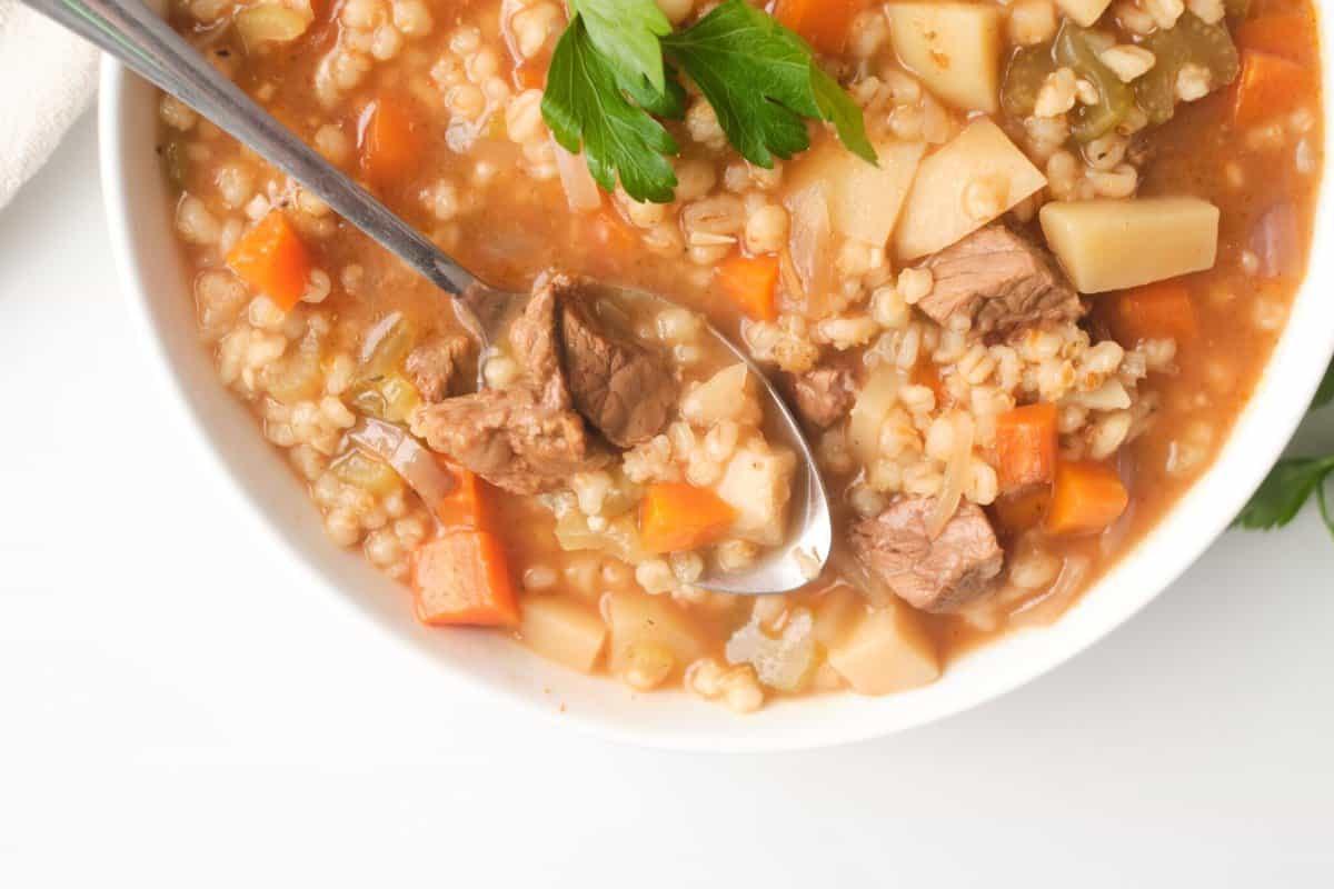 Bowl of slow cooker beef and barley weight watchers soup