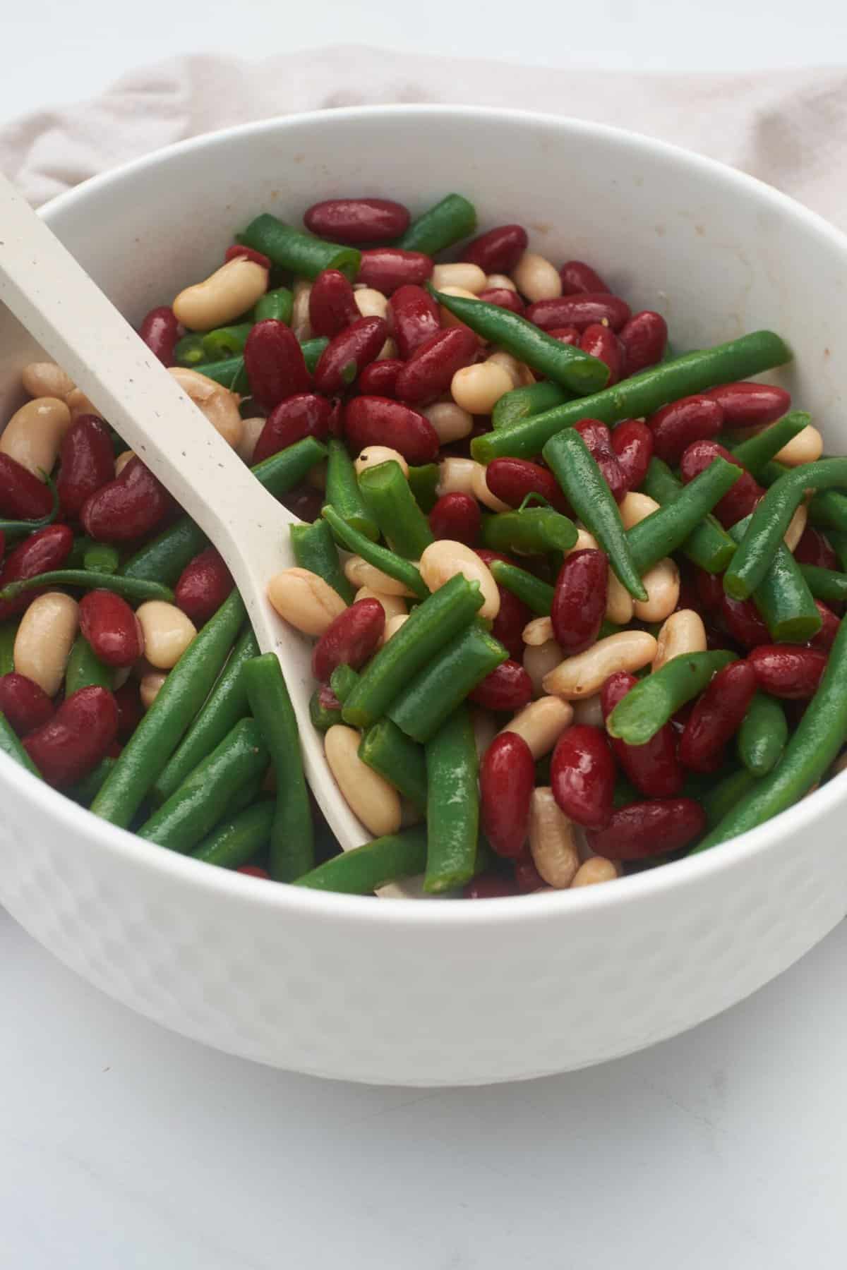 3 bean salad in white bowl