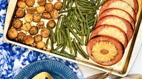 Ham and Pineapple sheet pan dinner with spatula