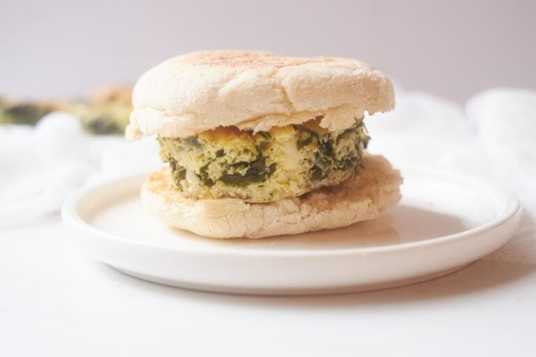 weight watchers friendly spinach and feta breakfast sandwich on english muffin. 