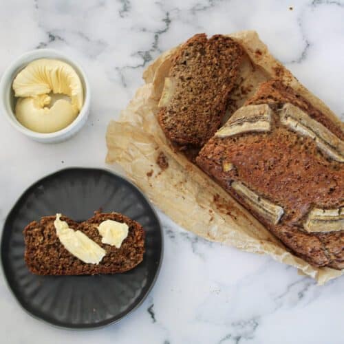 Banana bread loaf with one piece cut out