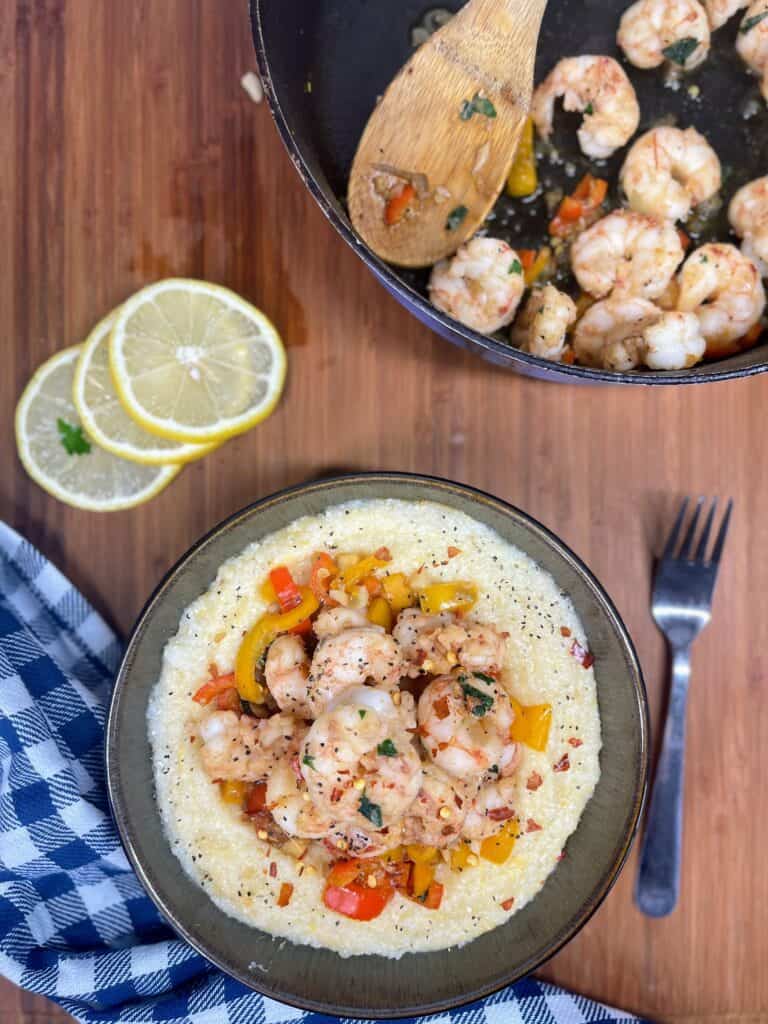 Bowl of cooked shrimp and grits