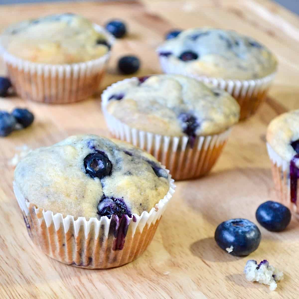 Blueberry muffins with fresh berries and crumbs