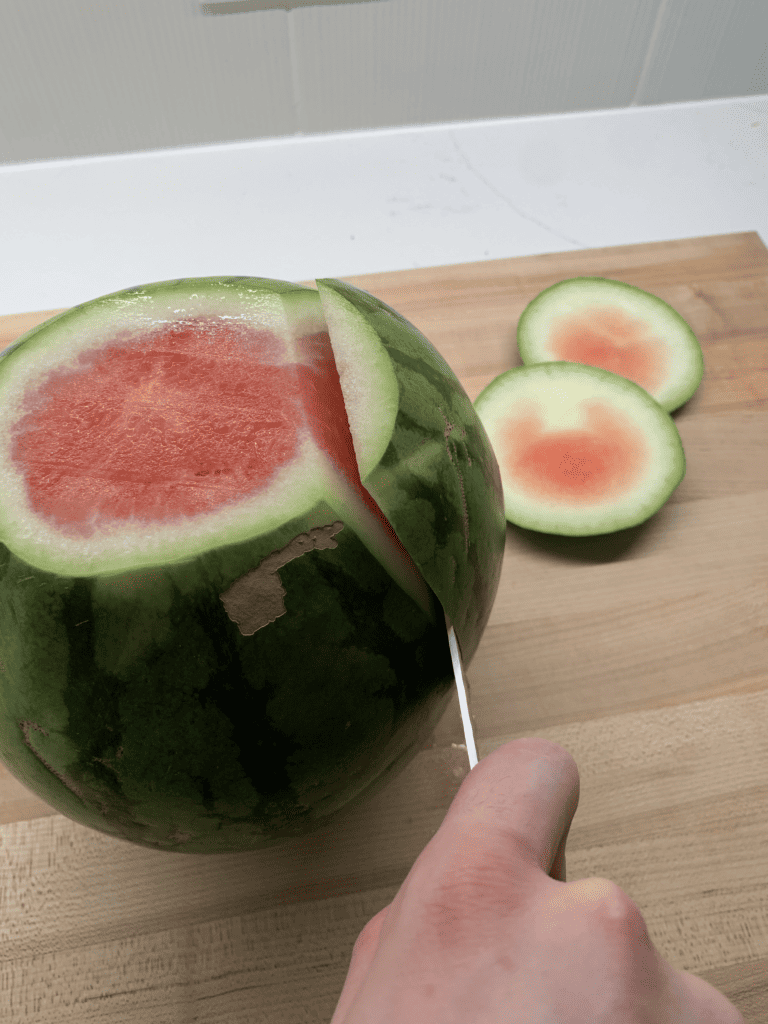 carving watermelon on its end