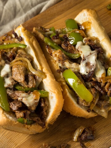 philly cheesesteak on cutting board