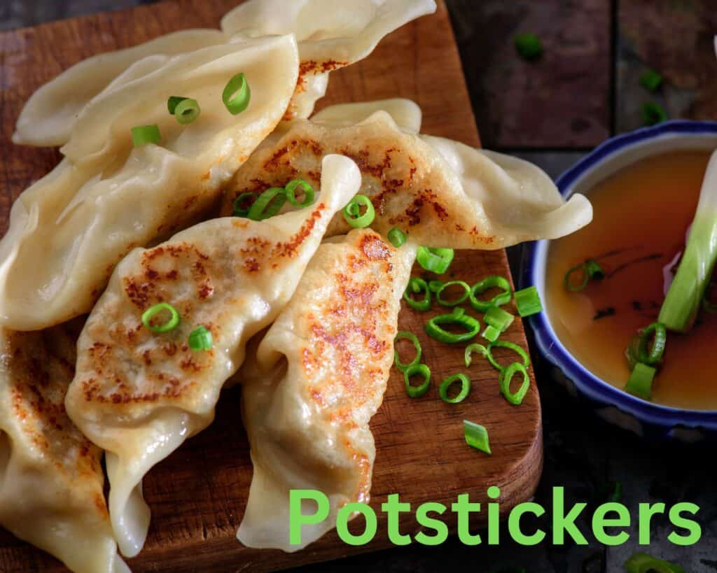 potstickers on wooden cutting board