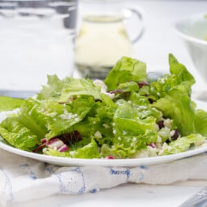 Maroulosalata salad on white plate with dressing