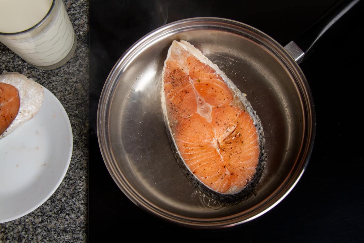 Salmon searing in pan