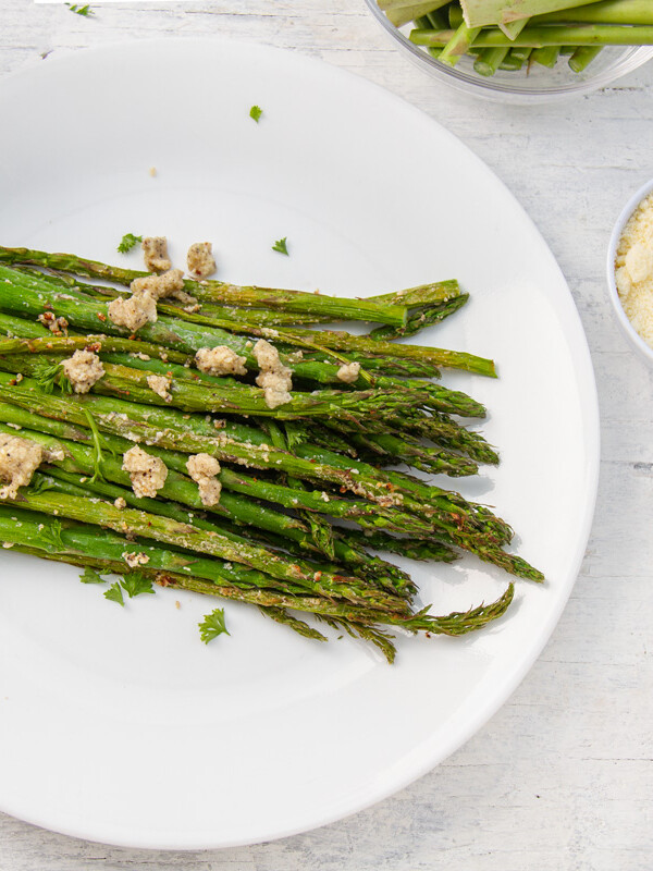 air fried asparagus on white plate