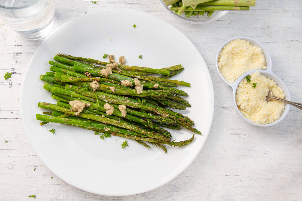 air fried asparagus on white plate