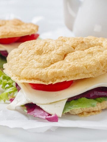 sandwich using cloud bread on white butcher paper