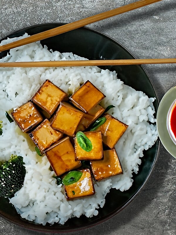 General Tso's Tofu on black plate