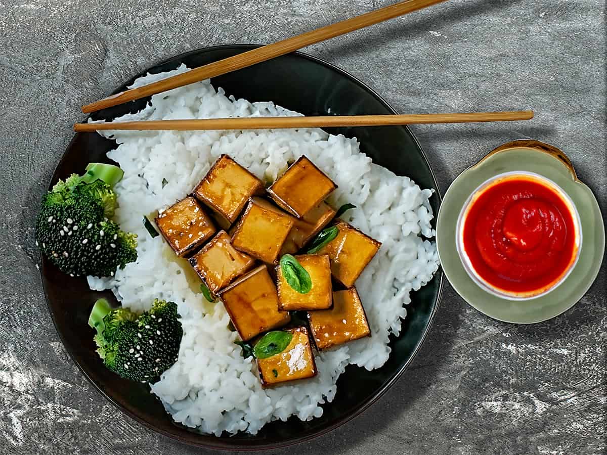 General Tso's Tofu on black plate