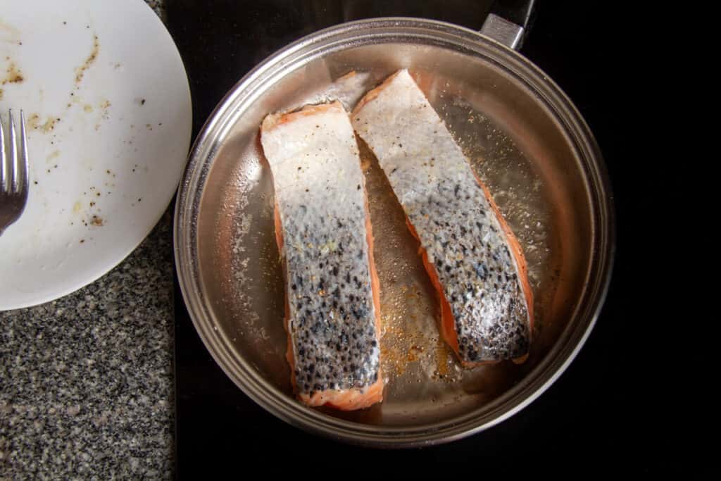salmon roasting in pan