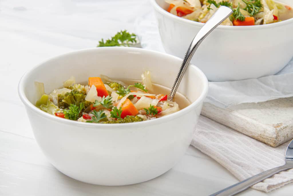 zero point veggie soup in white bowl