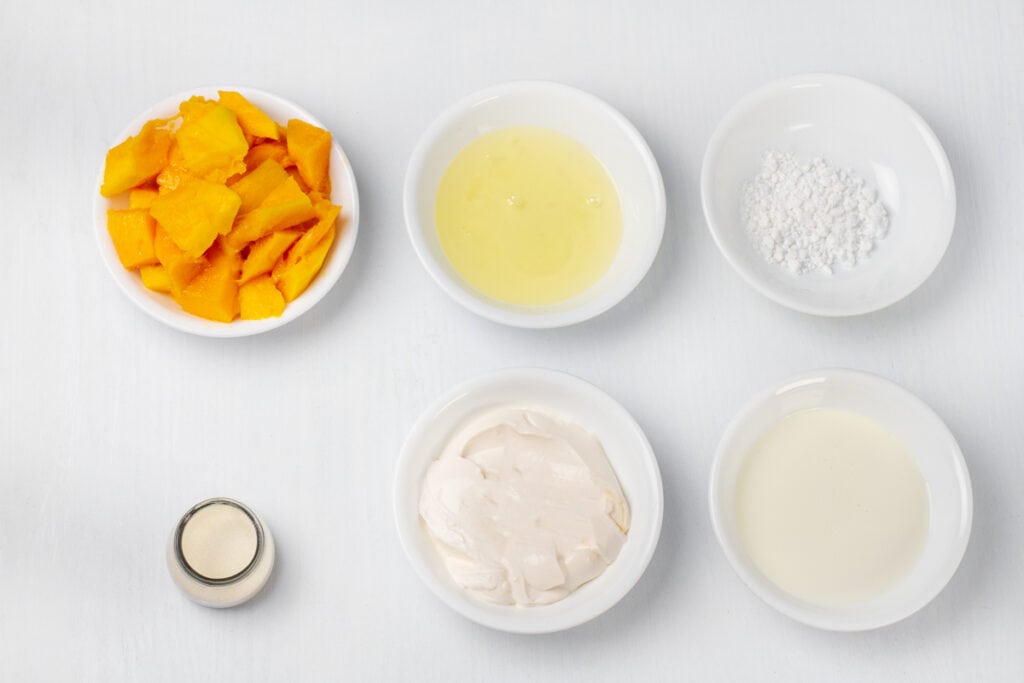 Ingredients for Mango Mousse. Chopped mango, lemon juice, unflavored gelatin, evaporated milk, plant-based milk, stevia, 2 egg whites. 