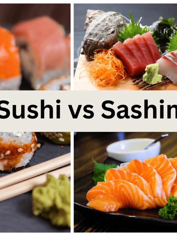 sushi rolls on black plate next to salmon sashimi on black plate