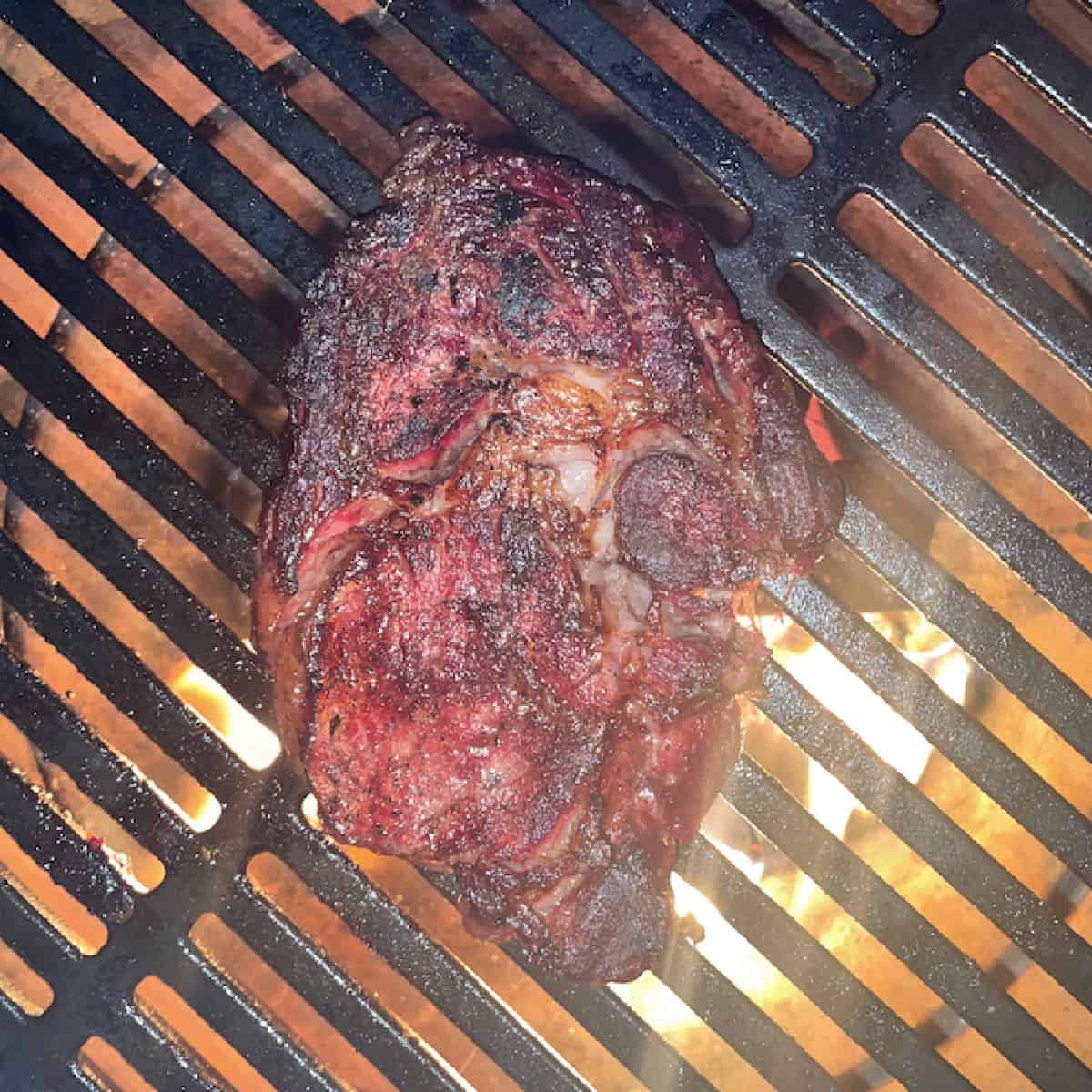 cooked ribeye steak on big green egg