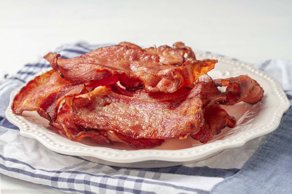 Crispy air fryer turkey bacon on a plate.