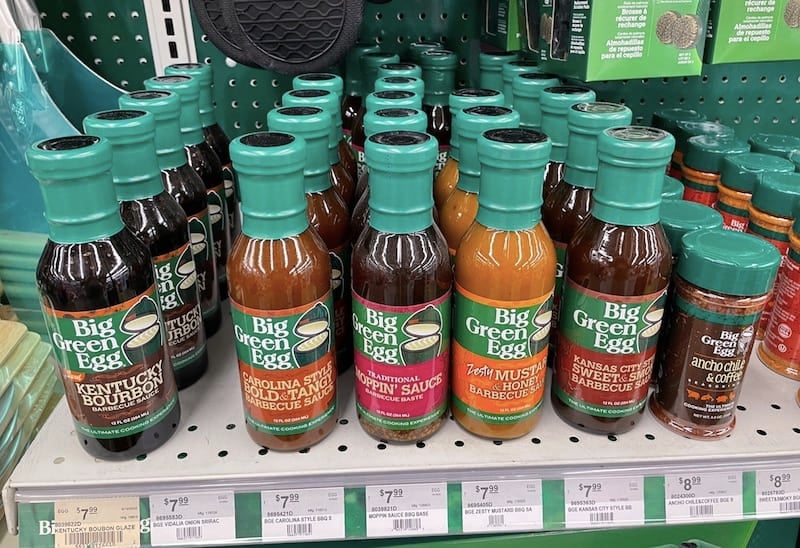 big green egg cooking sauces on a shelf