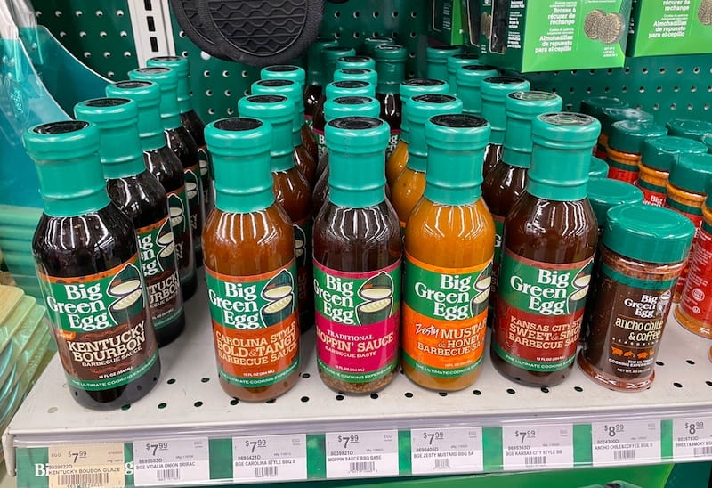 big green egg cooking sauces on a shelf