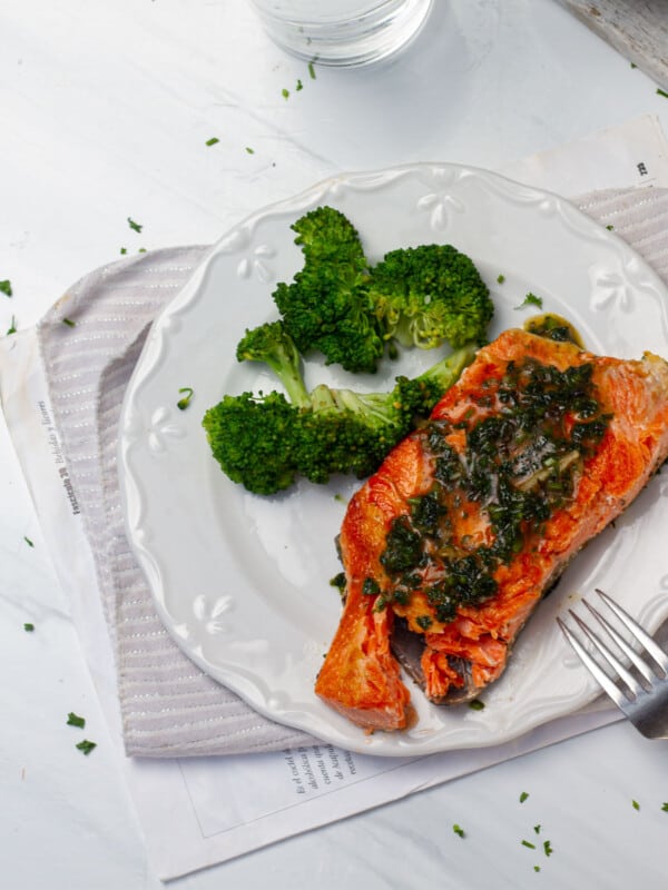 Herb Grilled Salmon (Olive Garden Copycat) with broccoli florets on a plate.