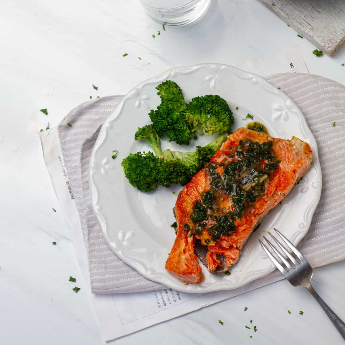 Herb Grilled Salmon (Olive Garden Copycat) with broccoli florets on a plate.