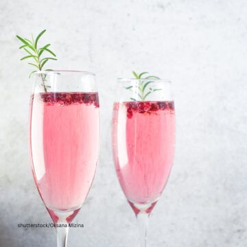 Mimosa cocktail with rose champagne in clear flutes