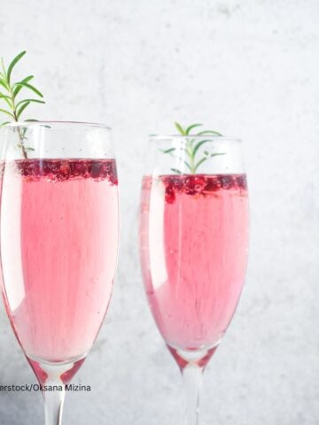Mimosa cocktail with rose champagne in clear flutes