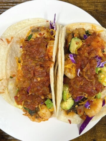 chipotle shrimp tacos on a plate