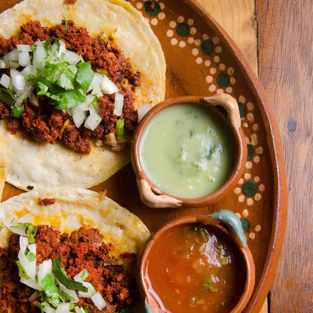 chorizo tacos on decorative plate
