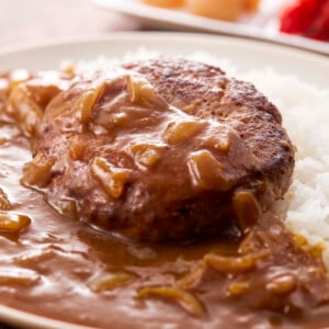 steak and rice on a plate