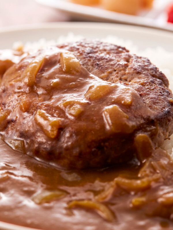 steak and rice on a plate